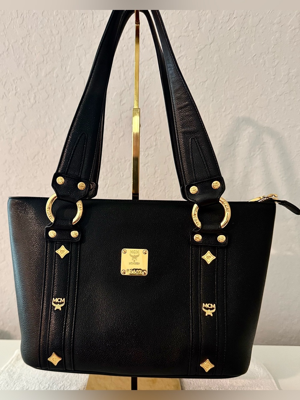 MCM Black Leather Shoulder Bag with Gold Hardware